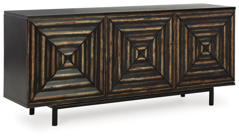 Ashley Furniture Fair Ridge Accent Cabinet with closed doors, wooden finish, and modern design, shown from an angled side view.