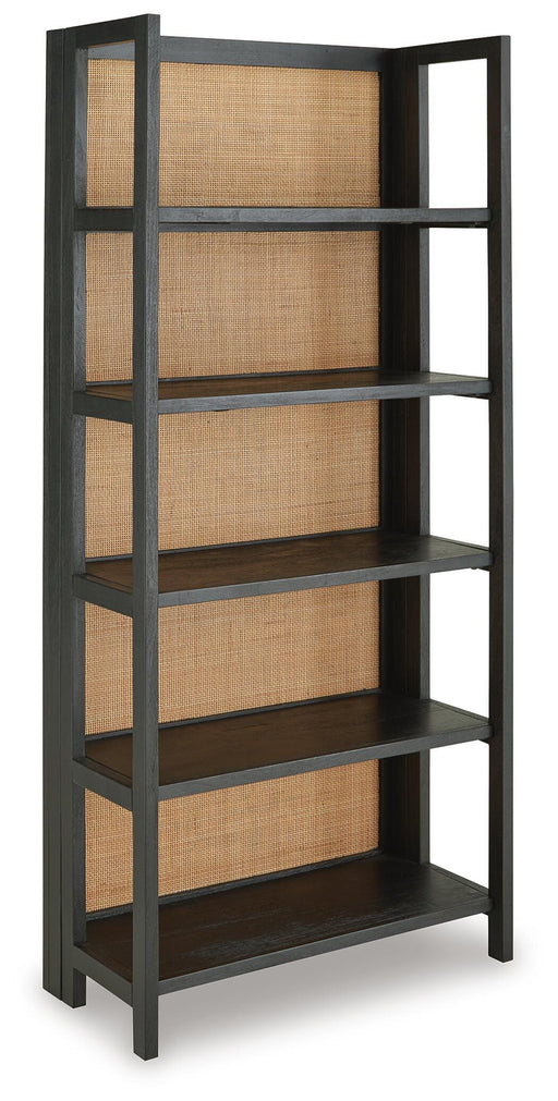 Ashley Furniture Abyard bookcase with wooden shelves and open storage design, shown from an angled side view.