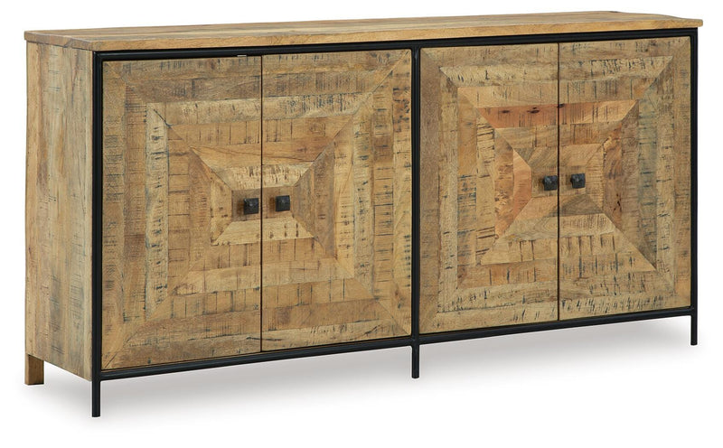 Ashley Furniture Camney Accent Cabinet with closed doors, showcasing a stylish wood finish and modern design in a well-lit room.
