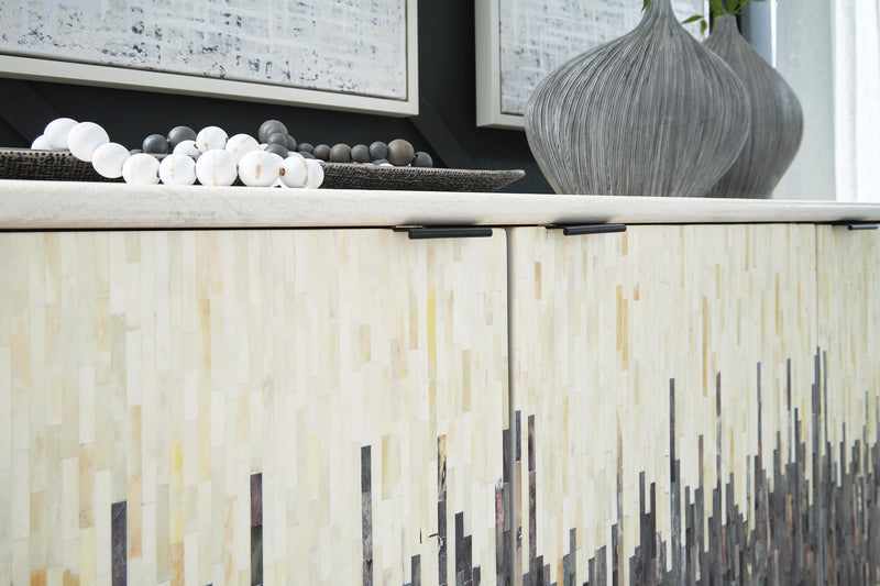 Ashley Furniture Freyton Accent Cabinet with wood finish and stylish design, featuring drawers and cabinet doors for storage.