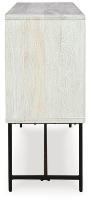 Ashley Furniture Freyton Accent Cabinet with sleek wood finish and modern design, shown from a side view.