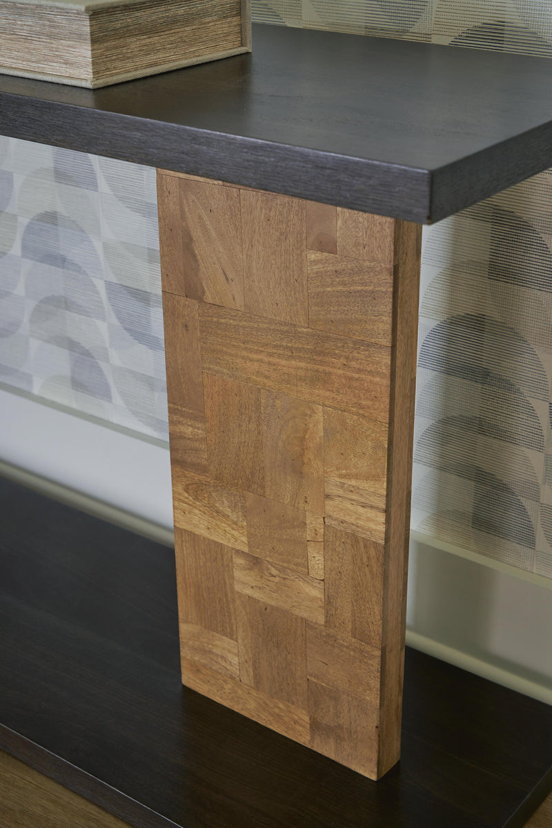 Ashley Furniture Camlett console sofa table with sleek wooden surface and tapered legs, ideal for entryways or living rooms.