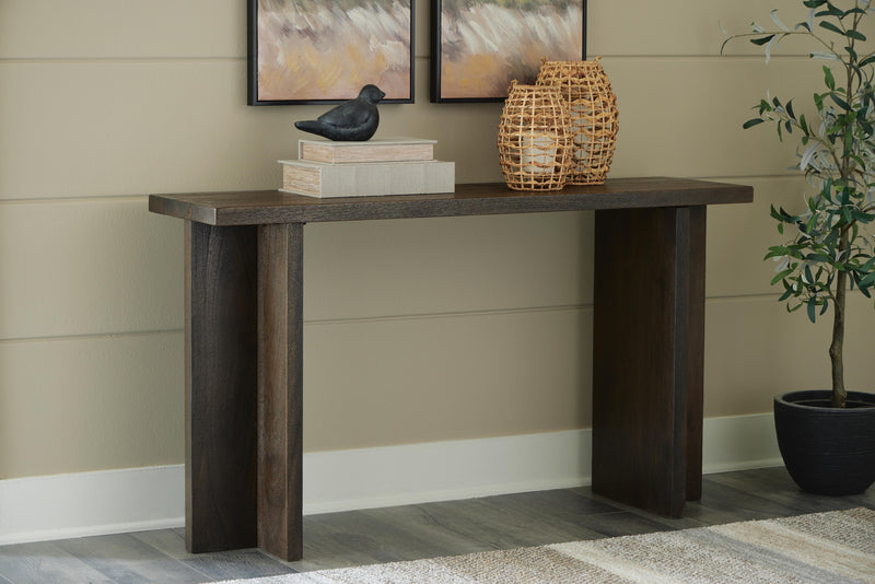 Ashley Furniture Jalenry Console Sofa Table with sleek wooden surface and modern design, ideal for living room decor.