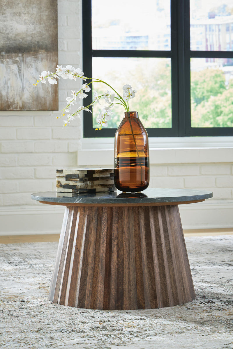 Ashley Furniture Ceilby accent coffee table with a sleek wooden top and modern design, perfect for living room decor.