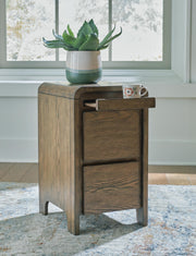 Ashley Furniture Jensworth accent table with a round wooden top and sleek metal legs, ideal for modern living room decor.