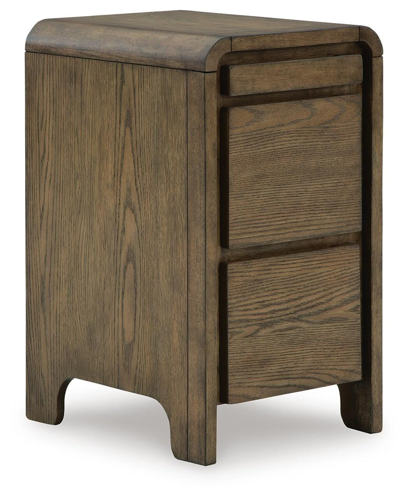 Ashley Furniture Jensworth Accent Table with a sleek wooden finish, shown from a side angle in a modern living space.