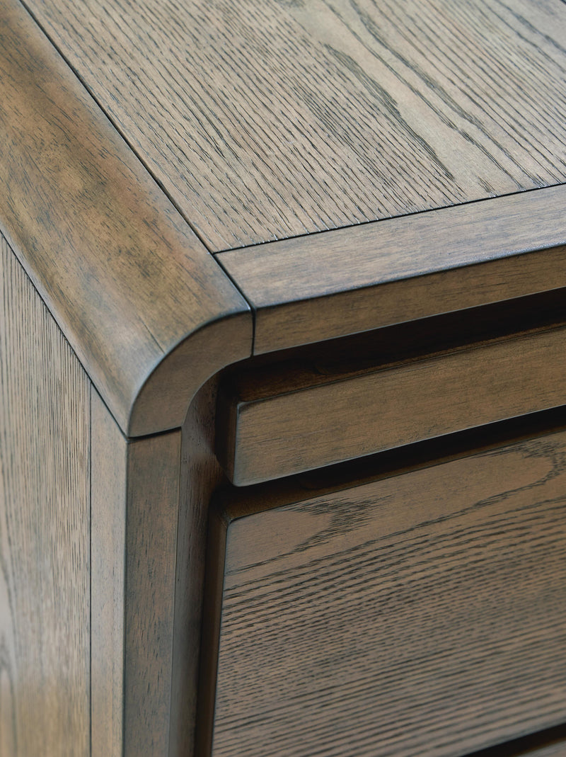 Ashley Furniture Jensworth Accent Table with a sleek wooden finish and modern design, perfect for living room decor.