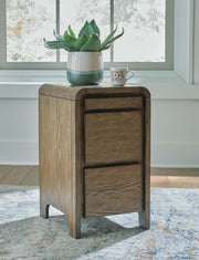 Ashley Furniture Jensworth accent table with a sleek wood finish and modern design, perfect for living room or bedroom decor.