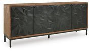 Ashley Furniture Dorannby accent cabinet with closed doors, featuring a sleek wooden design and modern style.