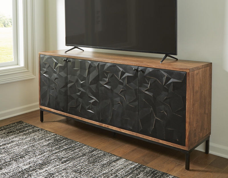 Ashley Furniture Dorannby Accent Cabinet showing a stylish wooden storage cabinet with a smooth finish and decorative hardware.