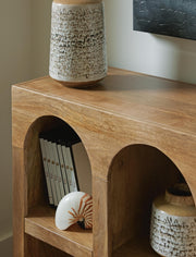 Ashley Furniture Luzmanacy Console Sofa Table with sleek wooden finish and modern design, detailed close-up view.