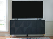 Ashley Furniture Loirwick Accent Cabinet with wood finish and decorative hardware, shown in a stylish living space.