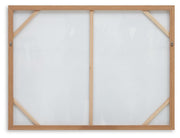 Ashley Furniture Chaseburn wall art featuring a modern, abstract design displayed on a wall in a contemporary living space.