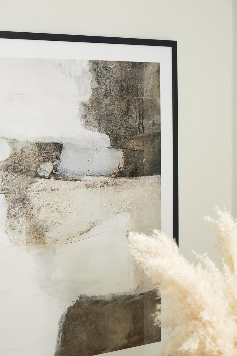 Close-up of Aldricton Wall Art by Ashley Furniture featuring intricate designs and a modern frame for stylish home decor.