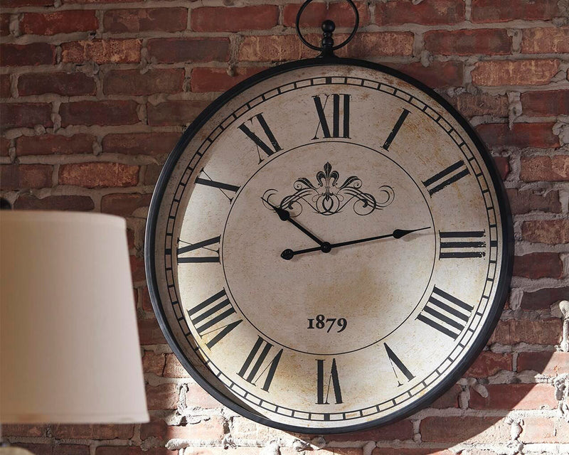 Ashley Furniture Augustina wall clock with a modern round design, featuring a sleek black frame and minimalist clock face.