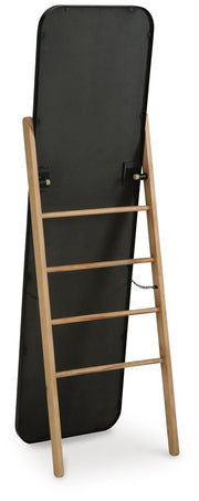 Bronick floor mirror by Ashley Furniture featuring a sleek, full-length design with a sturdy wooden frame.