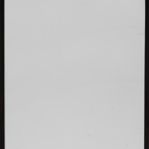 Ashley Furniture Bronick Floor Mirror, full-length mirror with a sleek frame, standing on a neutral background.