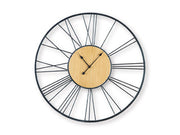 Ashley Furniture Brockett wall clock with a modern round design and black finish, featuring Roman numerals and minimalist style.