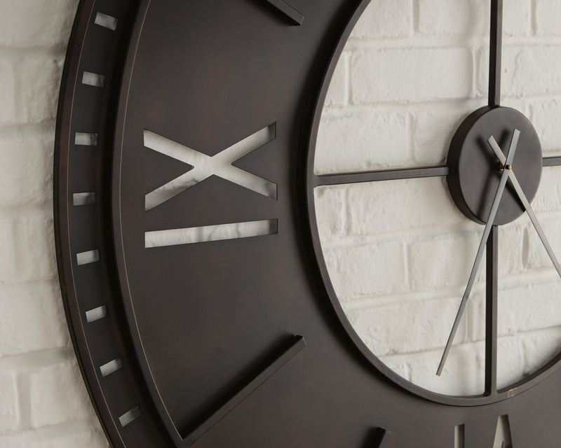 Ashley Furniture Lytle Wall Clock with a round face, black frame, and minimalistic design for modern home decor.
