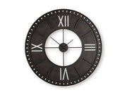 Ashley Furniture Lytle Wall Clock with a sleek round design and modern black frame, hanging on a wall.