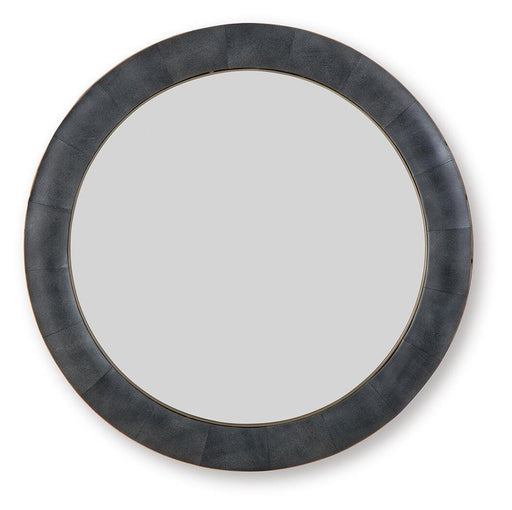 Ashley Furniture Corinsworth Accent Mirror with a sleek frame, hanging on a wall in a modern living room setting.