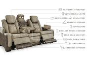 Ashley Furniture Next-Gen DuraPella Power Reclining Sofa with plush cushions and reclining features in a modern living room setting.
