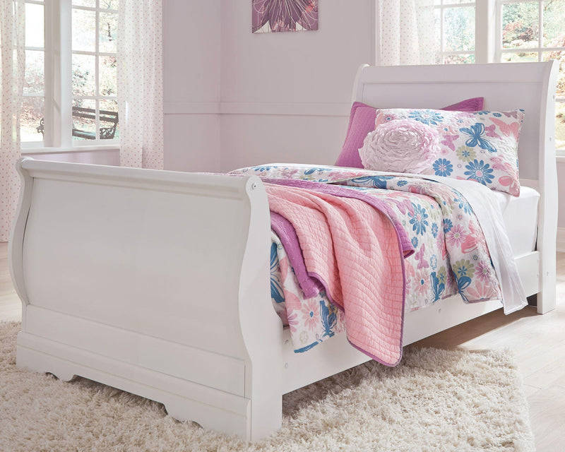 Ashley Furniture Anarasia Bed with a sleek wooden frame and elegant design, shown in a modern bedroom setting.