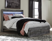 Ashley Furniture Baystorm storage bed with built-in drawers, featuring a modern design and dark wood finish.