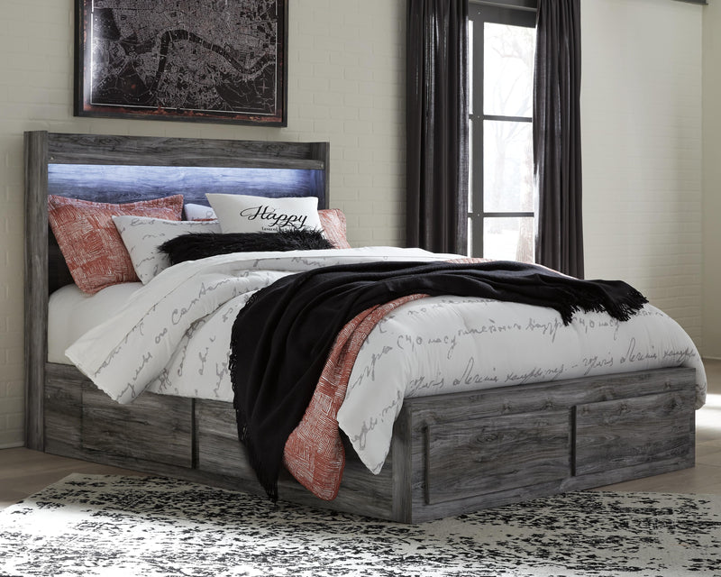 Ashley Furniture Baystorm Storage Bed with built-in drawers in a modern bedroom setting