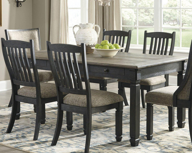 Ashley Furniture Tyler Creek dining room set with a wooden table and six matching chairs in a modern dining room setting.
