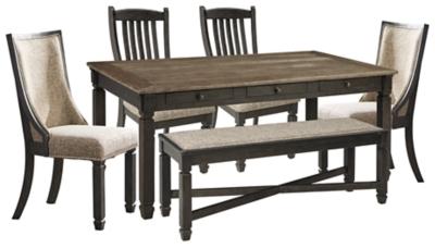 Ashley Furniture Tyler Creek dining room set with a table and matching chairs, ideal for a stylish dining space.
