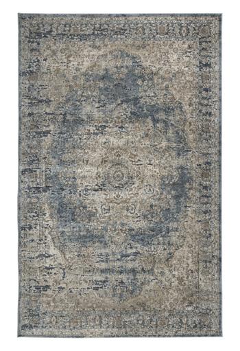 South 8x10 rug by Ashley Furniture featuring a stylish, patterned design with warm tones and plush texture.