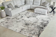 Medium Langwell Rug by Ashley Furniture featuring a textured, neutral-toned design for cozy home decor.