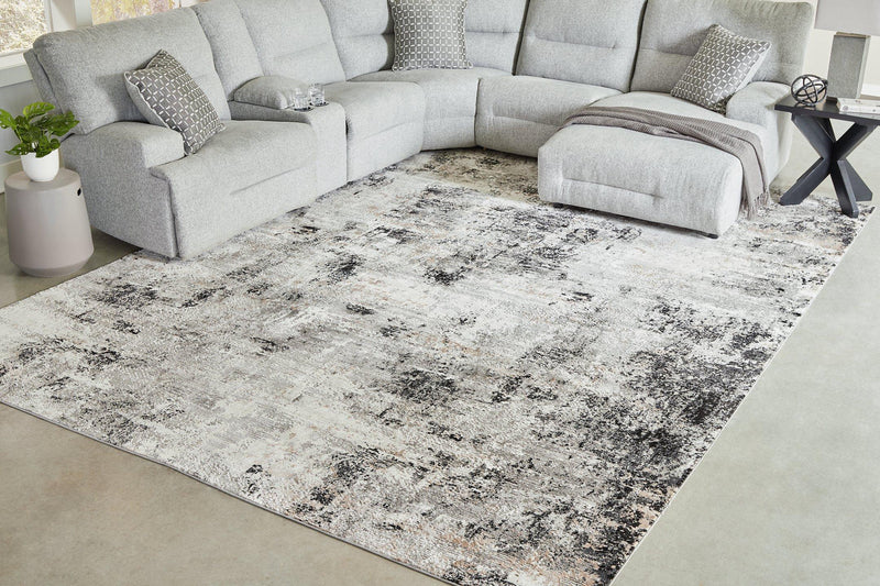 Medium Langwell Rug by Ashley Furniture featuring a textured, neutral-toned design for cozy home decor.
