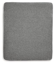 Ashley Hazela living room set with sofa and armchair, featuring modern upholstery and stylish design for comfortable home seating.