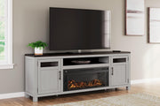 Ashley Darborn 88-inch TV stand with electric fireplace, wood finish, and storage cabinets for modern entertainment setup.