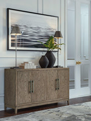 Ashley Furniture Chrestner dining server with wooden finish, featuring multiple drawers and cabinet doors for storage.