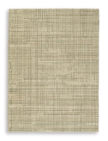 Ashley Furniture Janston Rug featuring a plush, patterned design in neutral tones, perfect for cozy living room decor.
