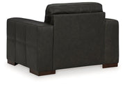 Ashley Furniture Luigi Oversized Chair with plush fabric, wide seating, and modern design for comfortable lounging.