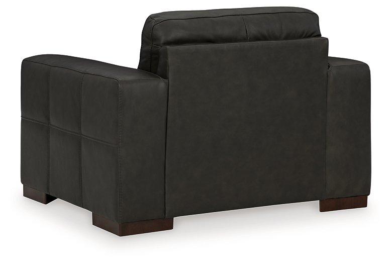 Ashley Furniture Luigi Oversized Chair with plush fabric, wide seating, and modern design for comfortable lounging.
