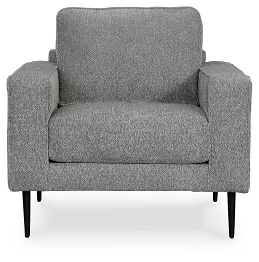 Ashley Hazela living room set featuring a sofa and loveseat with plush cushions and modern fabric upholstery in a cozy living space.
