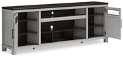 Ashley Darborn 88-inch TV stand with built-in electric fireplace, brown wood finish, modern design, and storage cabinets.