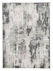Ashley Furniture Mazatl 7'10" x 10'2" rug featuring a detailed pattern and soft texture for stylish home decor.