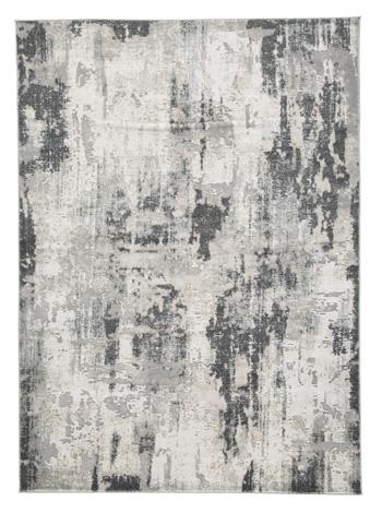 Ashley Furniture Mazatl 7'10" x 10'2" rug featuring a detailed pattern and soft texture for stylish home decor.