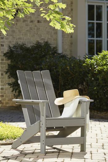 Outdoor Adirondack chair and end table set by Ashley Furniture, perfect for relaxing outdoor seating and casual gatherings.