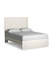 Ashley Furniture Stelsie bedroom set featuring a modern bed frame, matching nightstands, and dresser in a stylish bedroom arrangement.