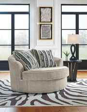 Ashley Furniture Calnita living room set with sofa, loveseat, and armchair in a cozy, modern design.