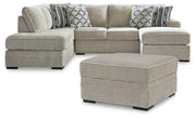 Ashley Furniture Calnita living room set with a sofa, loveseat, and matching armchair in a modern, comfortable design.