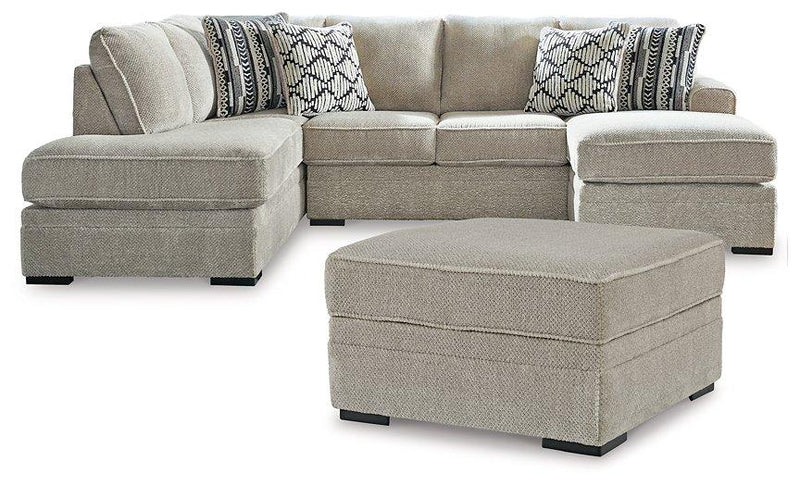 Ashley Furniture Calnita living room set with a sofa, loveseat, and matching armchair in a modern, comfortable design.