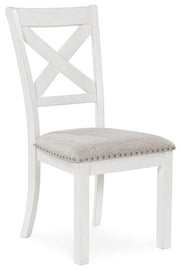 Ashley Furniture Robbinsdale dining package featuring a casual seating set with a table and chairs in a modern, stylish design.